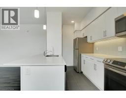 399 QUEEN Street S UnitNo. 101 - 22