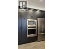 1975 FOUNTAIN GRASS DRIVE Drive UnitNo. 202 - 6