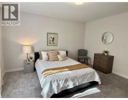 445 ROBERT WOOLNER Street - 27