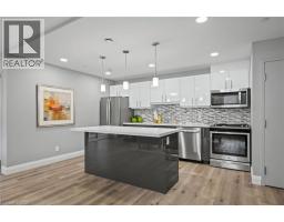 399 QUEEN Street S UnitNo. 202 - 40