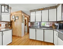 11 MAIN Avenue E - 14