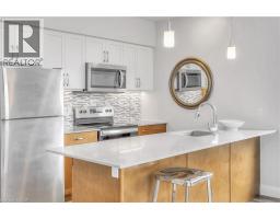 399 QUEEN Street S UnitNo. 211 - 11