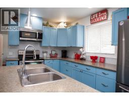 7675 RIVERSIDE DRIVE - 8