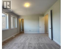1498 UPPER THAMES DRIVE - 32