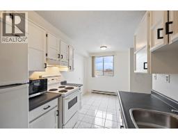 3936 WYANDOTTE STREET East UnitNo. 312 - 5