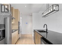 14400 TECUMSEH ROAD UnitNo. 413 - 9