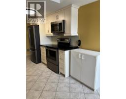 8335 WYANDOTTE STREET East UnitNo. 203 - 4