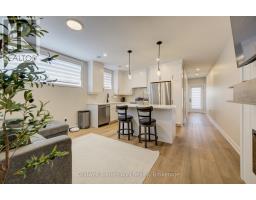 3 - 440 WELLINGTON STREET E - 1