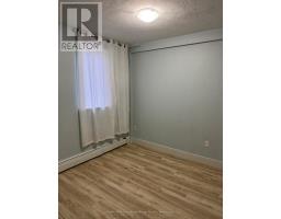 210 - 601 BARBER AVENUE N - 12
