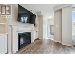 3 - 65 ELLIOT AVENUE E - 18