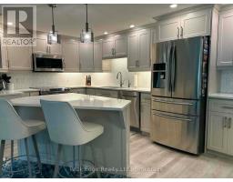 208 - 125 WILLIAM STREET N - 1