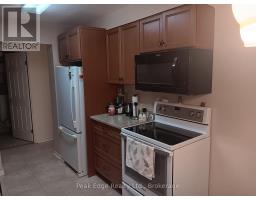 303 - 536 11TH AVENUE - 13