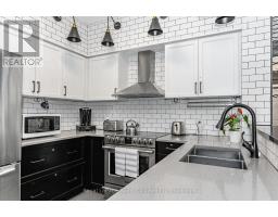 102 - 308 WATSON PARKWAY N - 1