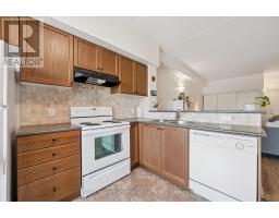 114 - 308 WATSON PARKWAY N - 12