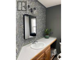 24 ROWAN RD - 77307 BLUEWATER HIGHWAY - 12