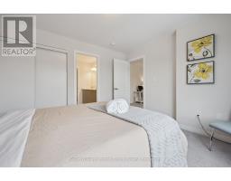 445 ROBERT WOOLNER STREET - 27