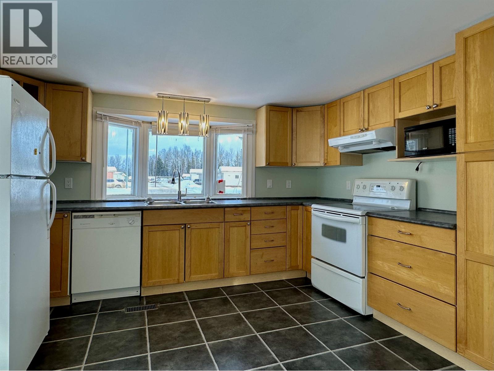 For sale: 1 2963 KLAHANNIE DRIVE, Fort Nelson, British Columbia