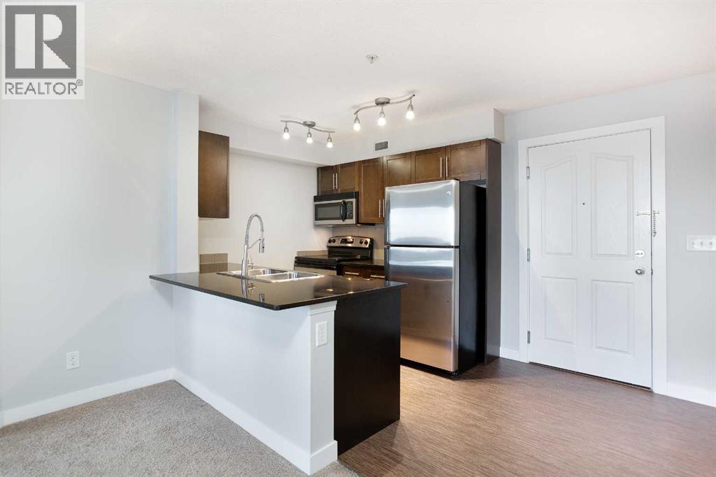 Apartment for Sale in 320, 7110 80 Avenue NE|Calgary, Alberta T3J0N4 3