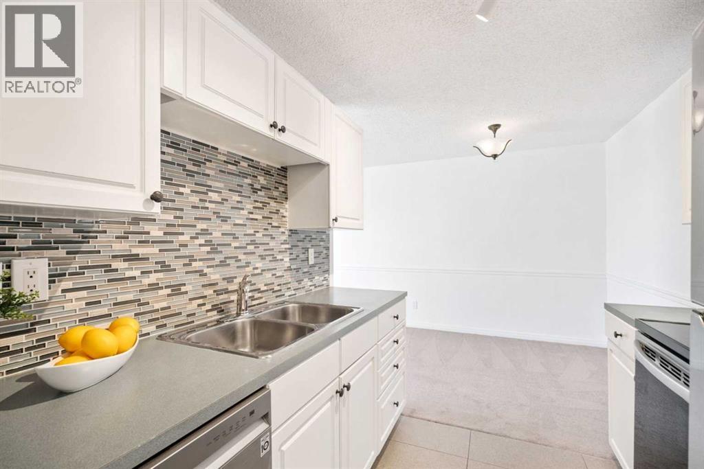 Apartment for Sale in 404, 1113 37 Street SW|Calgary, Alberta T3C1S5 5