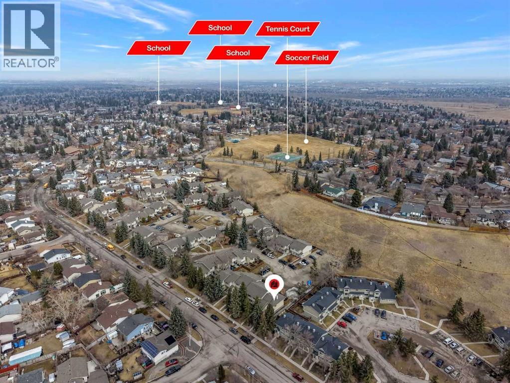 Row / Townhouse for Sale in 115 Deerfield Drive SE|Calgary, Alberta T2J6T9 2