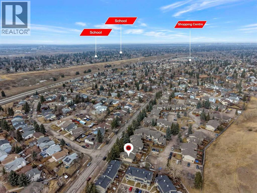 Row / Townhouse for Sale in 115 Deerfield Drive SE|Calgary, Alberta T2J6T9 3