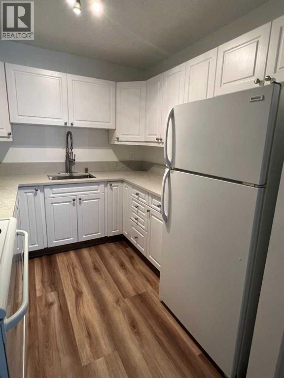 Apartment for Sale in 404, 1234 14 Avenue SW|Calgary, Alberta T3C0V9 5