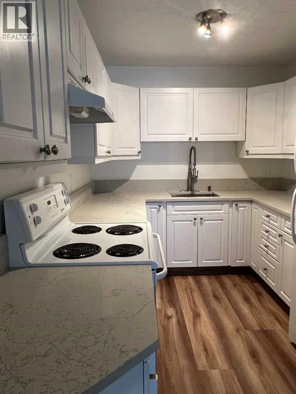 Apartment for Sale in 404, 1234 14 Avenue SW|Calgary, Alberta T3C0V9 4