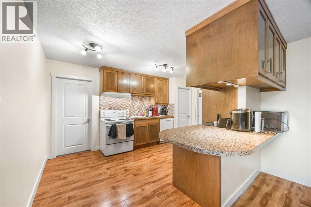 Apartment for Sale in 102, 3103 Blakiston Drive NW|Calgary, Alberta T2L1L7 2