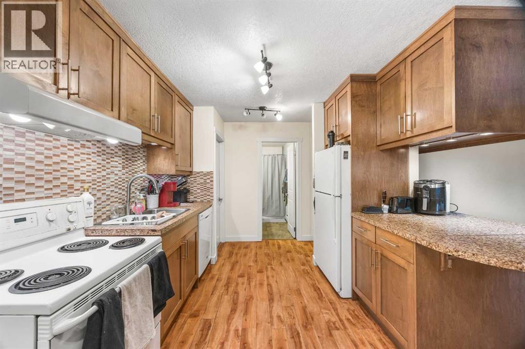 Apartment for Sale in 102, 3103 Blakiston Drive NW|Calgary, Alberta T2L1L7 4