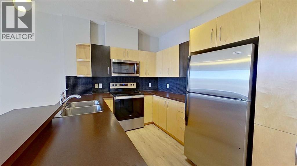 Apartment for Sale in 121, 69 Springborough Court SW|Calgary, Alberta T3H5V5 3