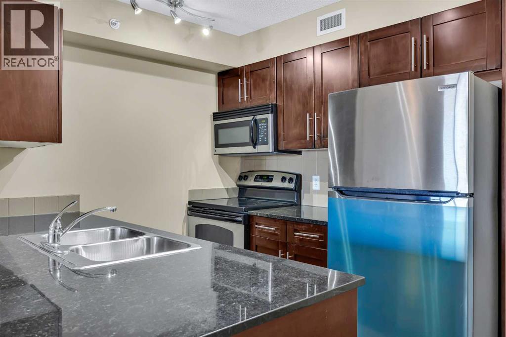 Apartment for Sale in 414, 7180 80 Avenue NE|Calgary, Alberta T3J0N6 5