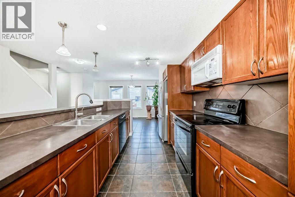 House for Sale in 9275 Saddlebrook Drive NE|Calgary, Alberta T3J5M5 4