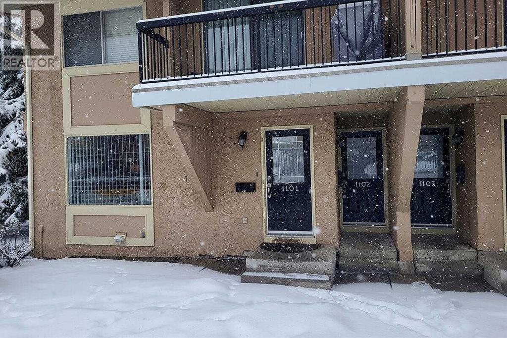 Row / Townhouse for Sale in 1101, 2200 Woodview Drive SW|Calgary, Alberta T2W3N6