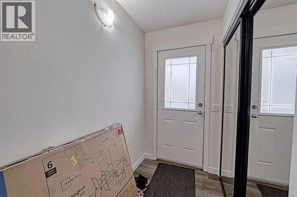 Row / Townhouse for Sale in 1101, 2200 Woodview Drive SW|Calgary, Alberta T2W3N6 3