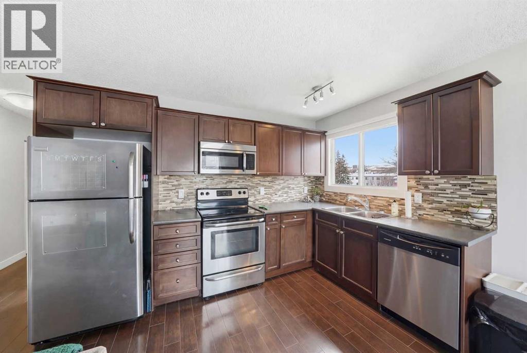 Apartment for Sale in 402, 2117 16 Street SW|Calgary, Alberta T2T4E5 4