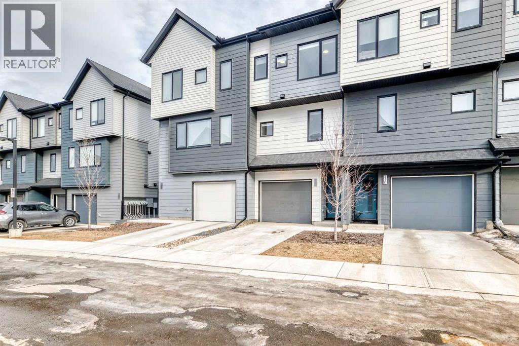 Row / Townhouse for Sale in 112 Evanscrest Square NW|Calgary, Alberta T3P1S2 2