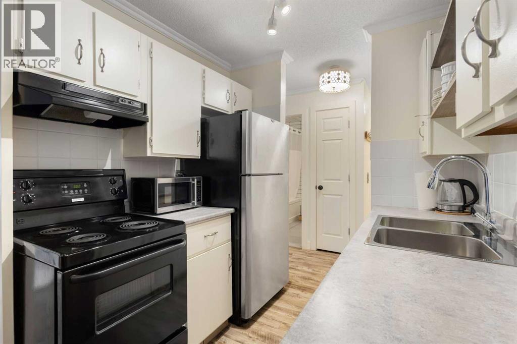 Apartment for Sale in 305, 2611 15A Street SW|Calgary, Alberta T2T4C1 5