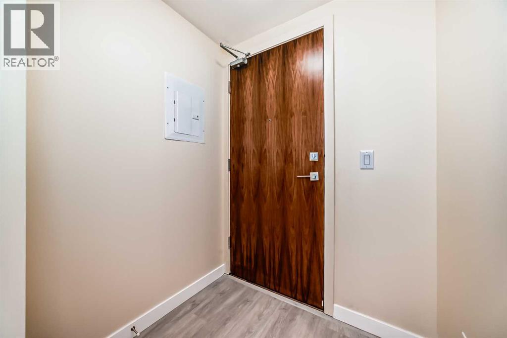 Apartment for Sale in 110, 51 Waterfront Mews SW|Calgary, Alberta T2P0X3 5