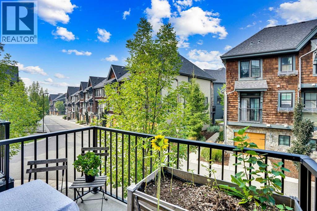 Row / Townhouse for Sale in 306 Ascot Circle SW|Calgary, Alberta T3H0X2 2