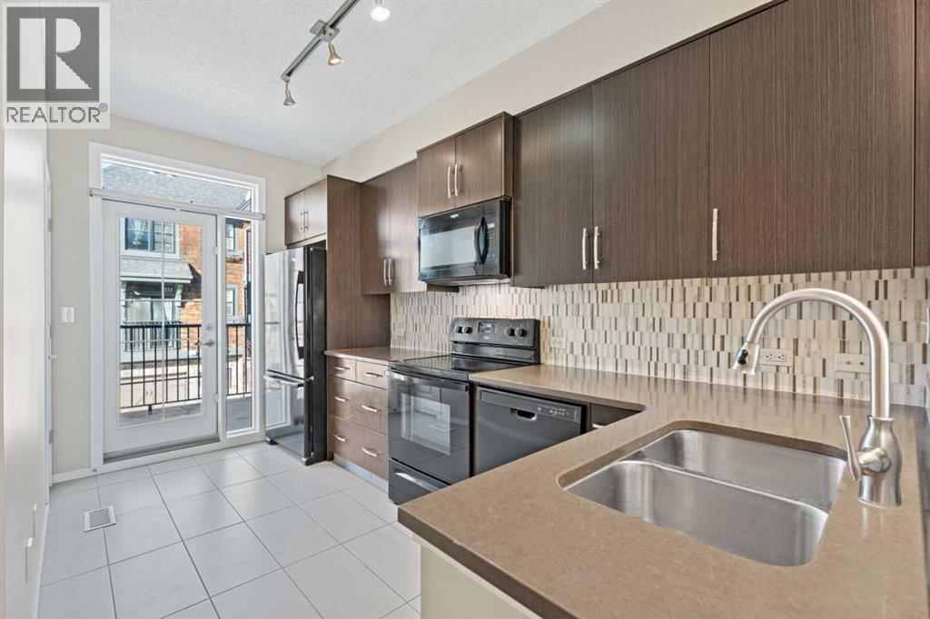 Row / Townhouse for Sale in 306 Ascot Circle SW|Calgary, Alberta T3H0X2 3