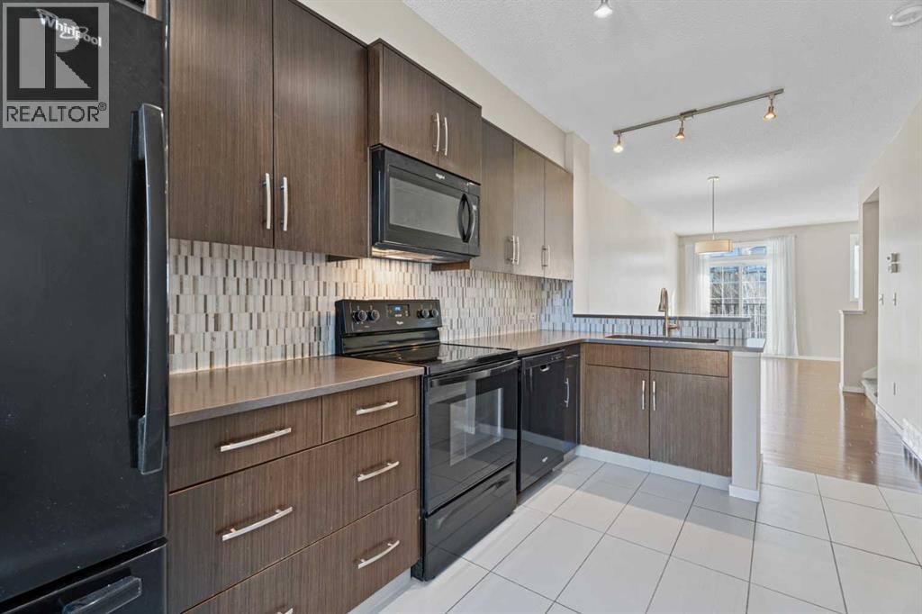 Row / Townhouse for Sale in 306 Ascot Circle SW|Calgary, Alberta T3H0X2 5