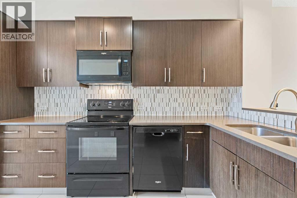 Row / Townhouse for Sale in 306 Ascot Circle SW|Calgary, Alberta T3H0X2 4