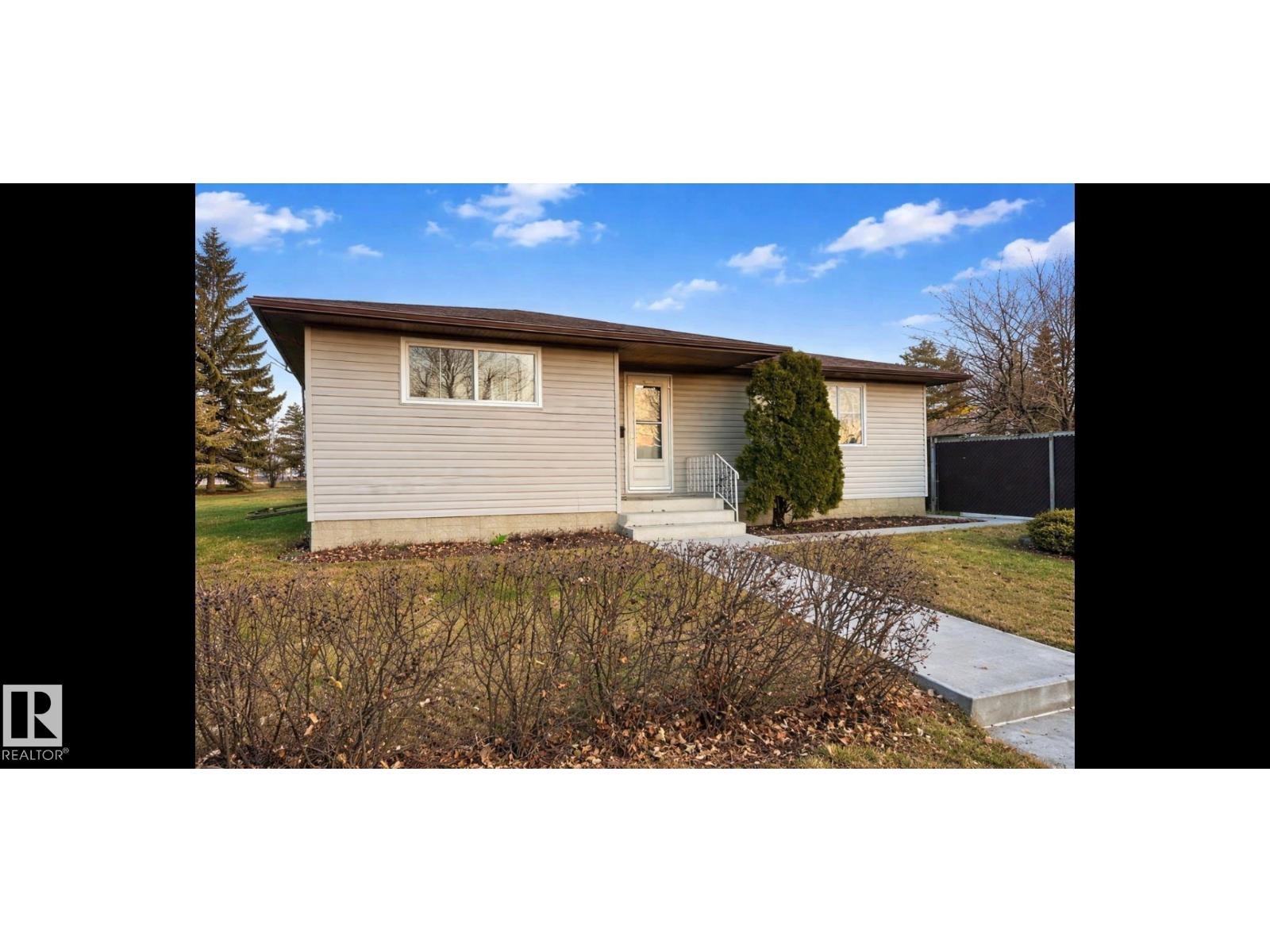Rear exterior — corner lot fencing, 14911 77 St NW Kilkenny