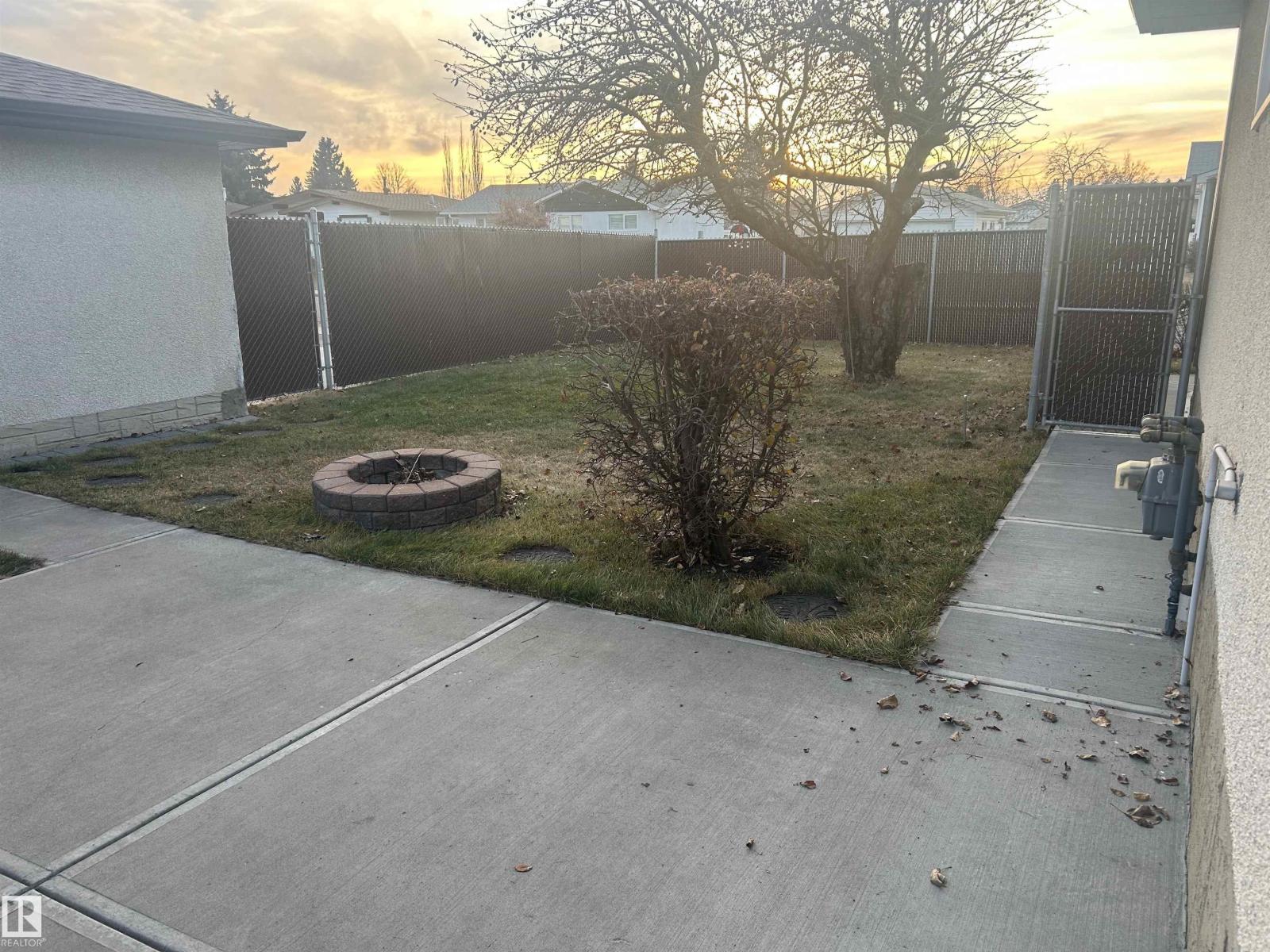 Side yard and entrance — 14911 77 St NW Kilkenny