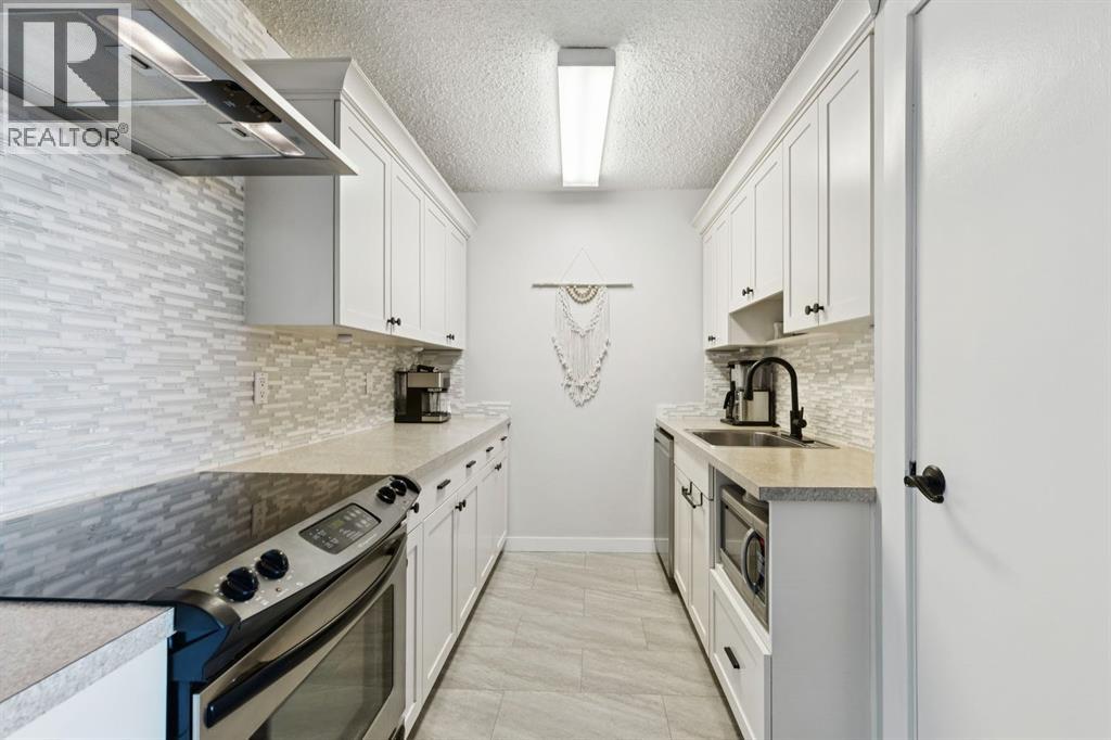 Apartment for Sale in 302, 314 14 Street NW|Calgary, Alberta T2N1Z8 4