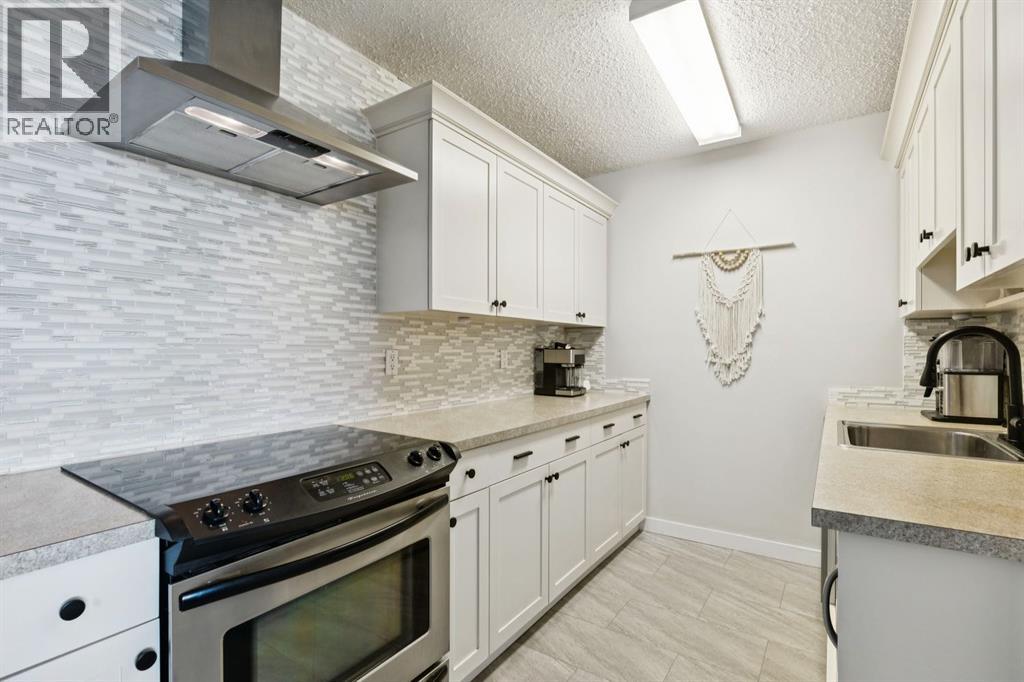 Apartment for Sale in 302, 314 14 Street NW|Calgary, Alberta T2N1Z8 5