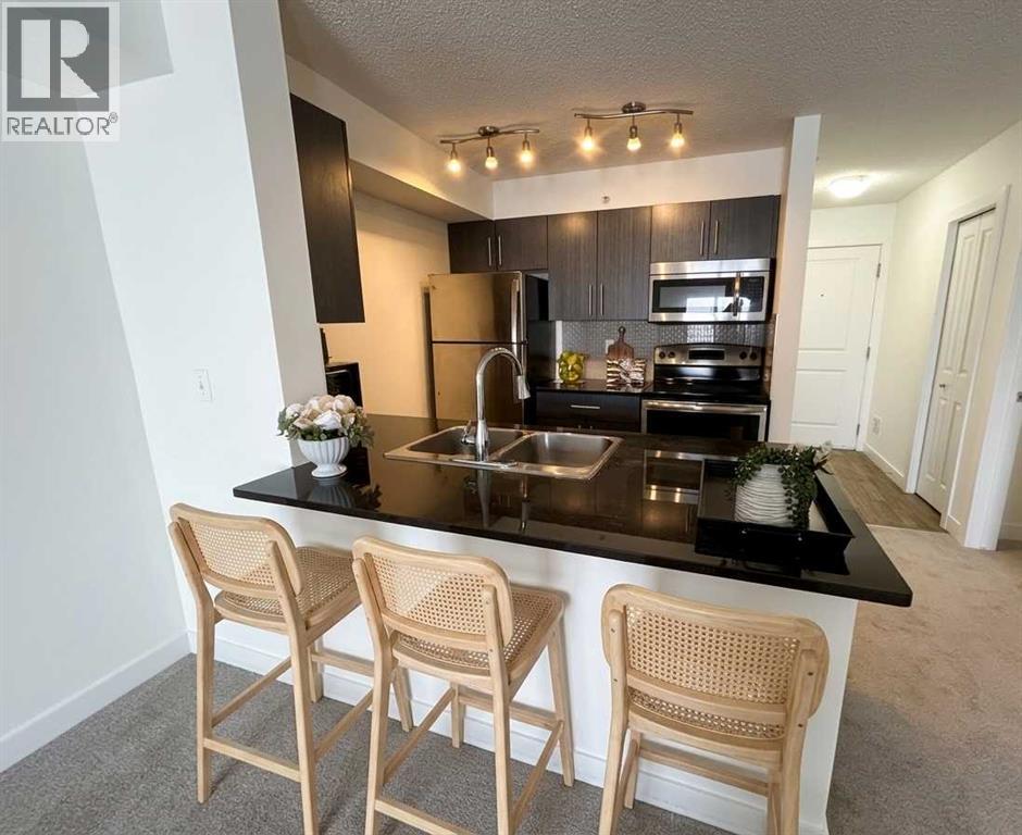 Apartment for Sale in 412, 5 Saddlestone Way NE|Calgary, Alberta T3J0S2 3