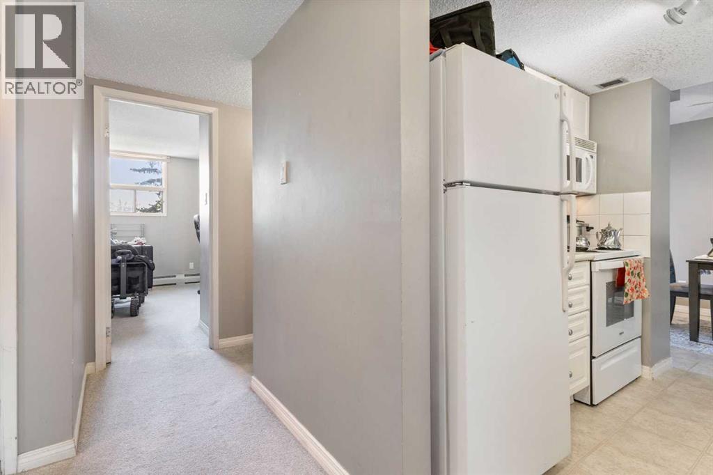 Apartment for Sale in 303, 30 Mchugh Court NE|Calgary, Alberta T2E7X3 4
