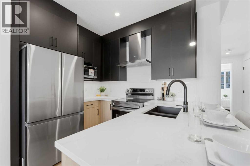 Row / Townhouse for Sale in 409, 200 Belvedere Boulevard SE|Calgary, Alberta T1X0L5 2