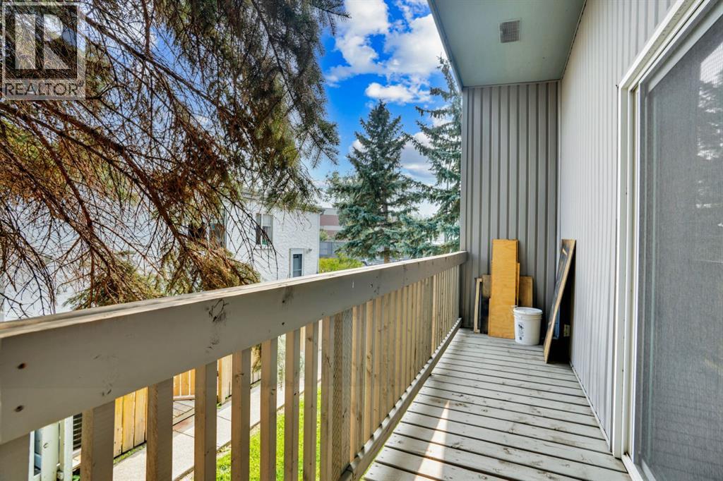 Row / Townhouse for Sale in 2, 459 Huntsville Crescent NW|Calgary, Alberta T2K4W3 5